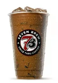 Delicious white chocolate mocha topped with creamy foam and a drizzle of white chocolate