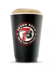 Freshly brewed mocha topped with creamy foam and a drizzle of chocolate