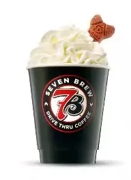 Small pup cup topped with whipped cream for a sweet dog treat